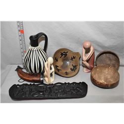 Selection of collectibles including powder horn, two stone carvings, seed pod bowls, carved African 