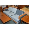 Image 1 : Mid century modern upholstered three seat sofa with teak highlights and matching chair