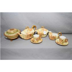 Royal Worcester tea set including tea pot, two cups and saucers plus cream jug and lidded sugar, not