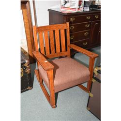 Antique mission style quarter cut oak rocking chair with upholstered seat