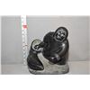 Image 1 : Large hand carved soapstone of a hunter with his catch, 10 1/2" in height