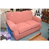 Image 1 : Upholstered loveseat/hide-a-bed with throw cushions