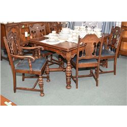 Antique oak refractory style draw leaf dining table and six chairs including one carver to match lot