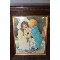 Two framed prints including a harvest maiden and two Victorian children with their puppy