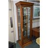 Image 1 : Semi contemporary oak framed illuminated curio cabinet with glass shelves, glass sides, bevelled and