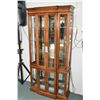 Image 1 : Semi contemporary illuminated four door display cabinet with multiple glass shelves and panels