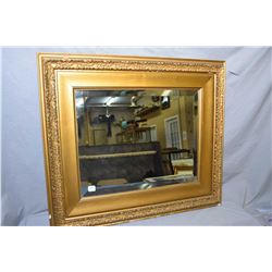 Gilt framed bevelled mirror, overall dimensions 25" X 29"