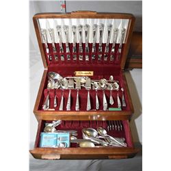 Two wooden canteens of silver-plate flatware including servings for eight of Community flatware with