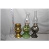 Image 1 : Three vintage oil lanterns including green glass with chimney, cast lamp with chimney and brass colo