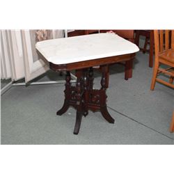 Antique Eastlake marble top lamp table with carved base