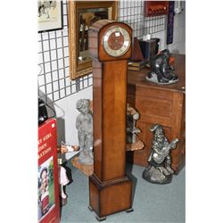 English made walnut cased chiming granddaughter's clock 52 1/2" in height, working at time of catalo