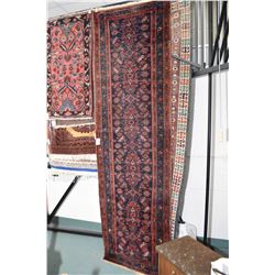 Wool runner with multiple medallions and borders in shades of blues, reds, and taupe, 36" X 118"