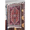 Image 1 : Small wool throw rug with large medallion in shades of red, blue and white 24" X 36"