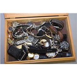 Wooden box containing a selection of vintage watches including vintage Timex, Michael Kors, Guess, S