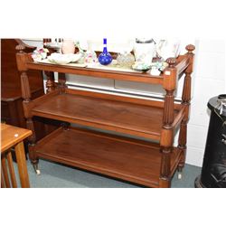 Antique three tier mahogany cart with reeded supports and porcelain castors, 46" in width, 42" in he