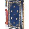 Image 1 : Oriental wool area rug with potted plant and floral decoration, scrolled border in shades of Royal b