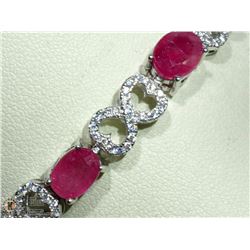 44) STERLING SILVER ENHANCED RUBY AND CZ BRACELET