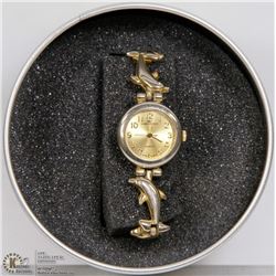 GIAN GIORGIO DOLPHIN BAND GOLD TONE WATCH.