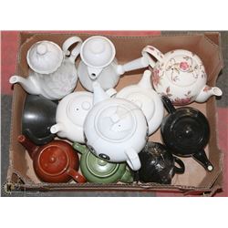 BOX OF ASSORTED TEA POTS.