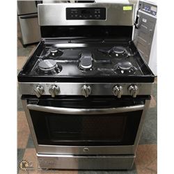 GE GAS TOP CONVECTION RANGE WITH CENTER GRIDDLE.