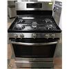 Image 1 : GE GAS TOP CONVECTION RANGE WITH CENTER GRIDDLE.