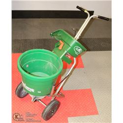 HANDHELD FERTILIZER WITH PUSH FERTILIZER