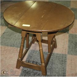 ROUND BROWN SOLID WOOD TABLE WITH