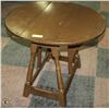 Image 1 : ROUND BROWN SOLID WOOD TABLE WITH