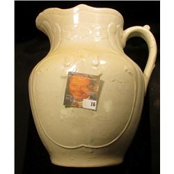 Antique Stoneware off-white colored Pitcher, no wash bowl. Several hair line cracks. 10 1/2".