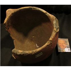 Unrestored Pot with museum number 2729, labeled on bottom, "Poinsett Co., Ark.". 6" x 3 1/2".
