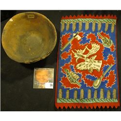 Old tobacco Flannel with Indian Motif and an excavated partially restored Indian Pot with museum num