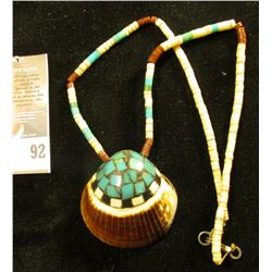 Beaded Necklace with inlaid Clam Shell. Autographed on back by artist "Charlotte Aqullar".