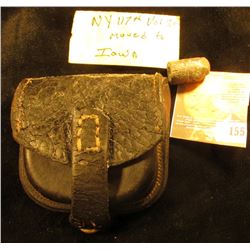 Civil War Leather Bullet Pouch with a 58 caliber Conical Bullet. Tag states "NY 117th Vol.30 Moved t