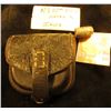 Image 1 : Civil War Leather Bullet Pouch with a 58 caliber Conical Bullet. Tag states "NY 117th Vol.30 Moved t