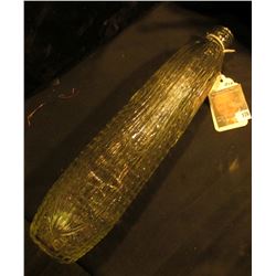 13 1/4" Corn Cob Bottle 3" diameter. Clear glass, embossed. "MSRF" on base.