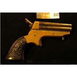  C. Sharps & Co.  Four-barreled .22 caliber Derringer with very ornate Bakelite Grips. Most likely t