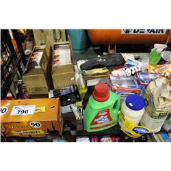SHELF LOT OF HALLOWEEN CANDY, SEASONINGS, LAUNDRY DETERGENT, CHOCOLATE AND MORE