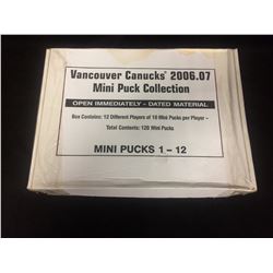 VANCOUVER CANUCKS' 2006-07 MINI PUCK COLLECTION (MINI PUCKS 1-12)