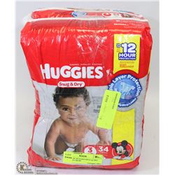 3 BAGS OF HUGGIES SNUG & DRY FOR 16 TO 28LBS