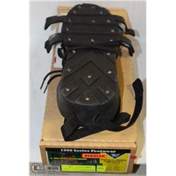 NEW PAIR OF KORKERS  SIZE:LARGE STUDDED OVER-SHOE