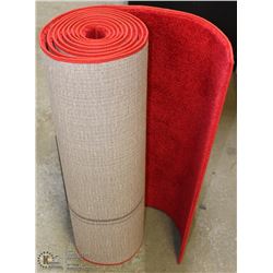 ROLL OF RED RUN OFF CARPET