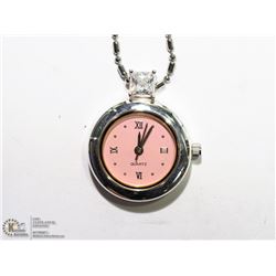 10) QUARTZ PINK FACE PENDANT WATCH WITH CHAIN.