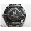 Image 2 : 11) BLUE FACE SWAROVSKI WATER RESISTANT WATCH.