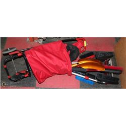 LOT OF SNOWBRUSHES, SHOVEL AND MORE.