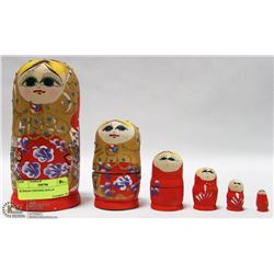 RUSSIAN NESTING DOLLS.