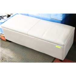 GREY LEATHER STORAGE BENCH. 51X20X17 SMALL TEAR ON
