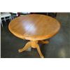 Image 1 : ROUND MAPLE DINING TABLE WITH JACK KNIFE LEAF AND FOUR OAK ROLLING CHAIRS