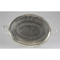 An oval tea tray, with egg-and-dart border and pair of mask and scroll handles, the field with ba...