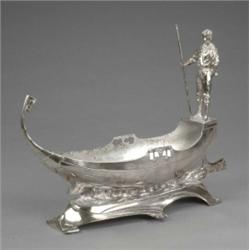 An unusual WMF silver plated centrepiece, modelled as gondola with gondolier, shaped angular base...