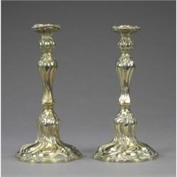 A pair of WMF table candlesticks, of sinuous baluster form, on shaped circular bases, 31cm high,...